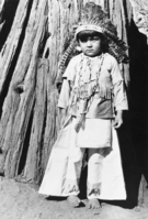 Copy Neg: 1984 by M. Dixon; Jackie Oliver, about 5 years old behind the Yosemite Museum for Native American demonstration with his uncle Chris "Chief Lemee" Brown.