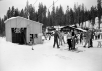 Crowds at Badger Pass and operation of Constam.