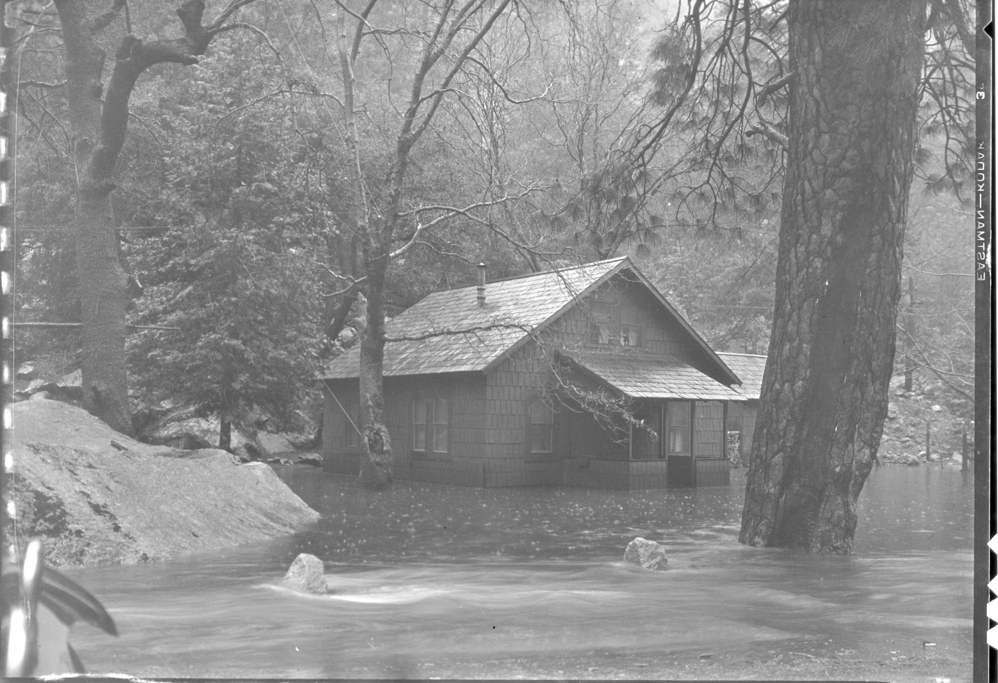 Employees' Cottage surrounded by Flood Waters