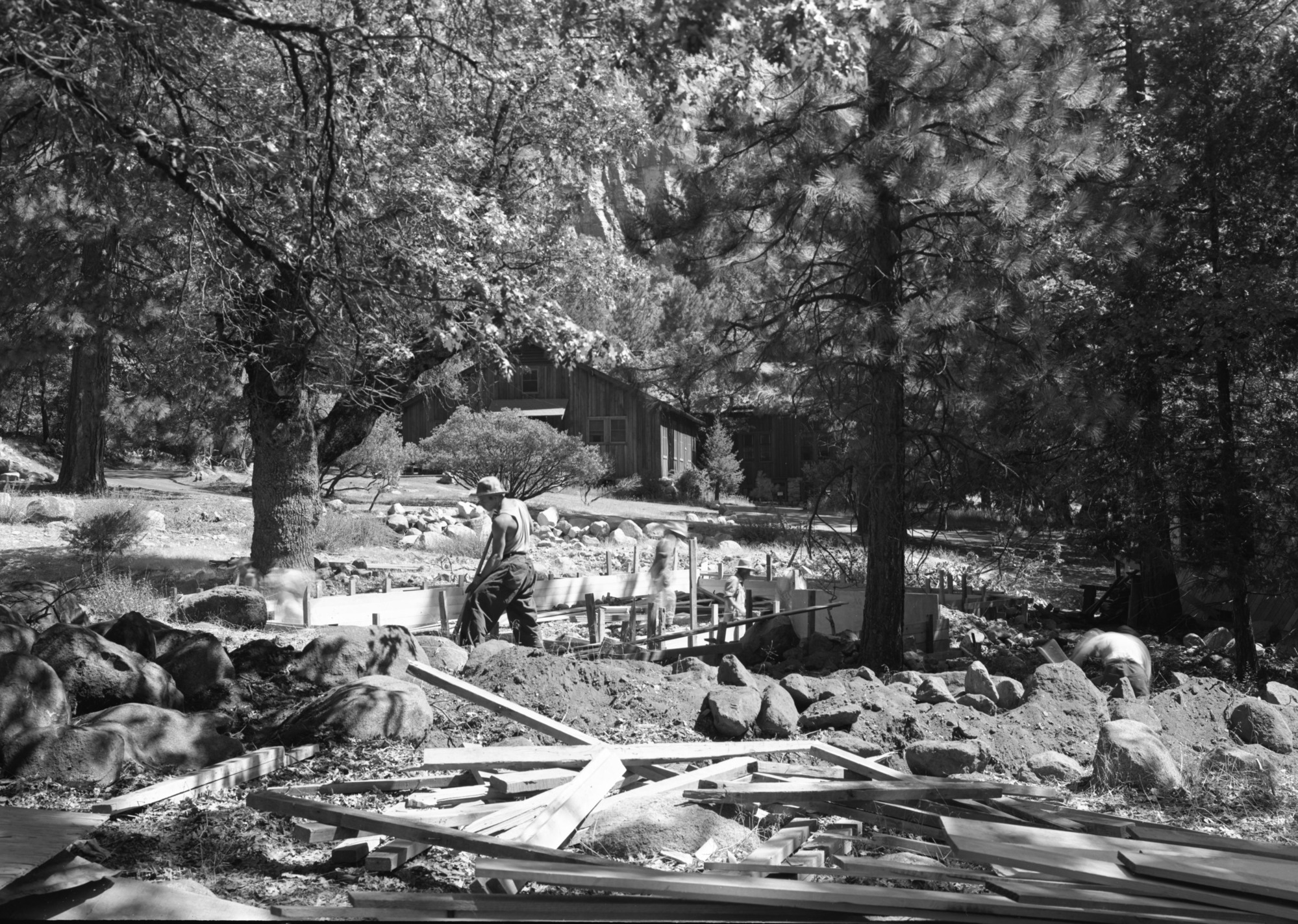 Work in Tecoya Residence area, hopsital in background.
