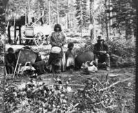 Copy Neg: July 1985 by Michael Dixon. Detail of Stereograph RL-16,571. Native American family group. Caption: "Central Pacific Railroad. 598. Group of Digger Indian Squaws." Near Tahoe or Donner Pass.