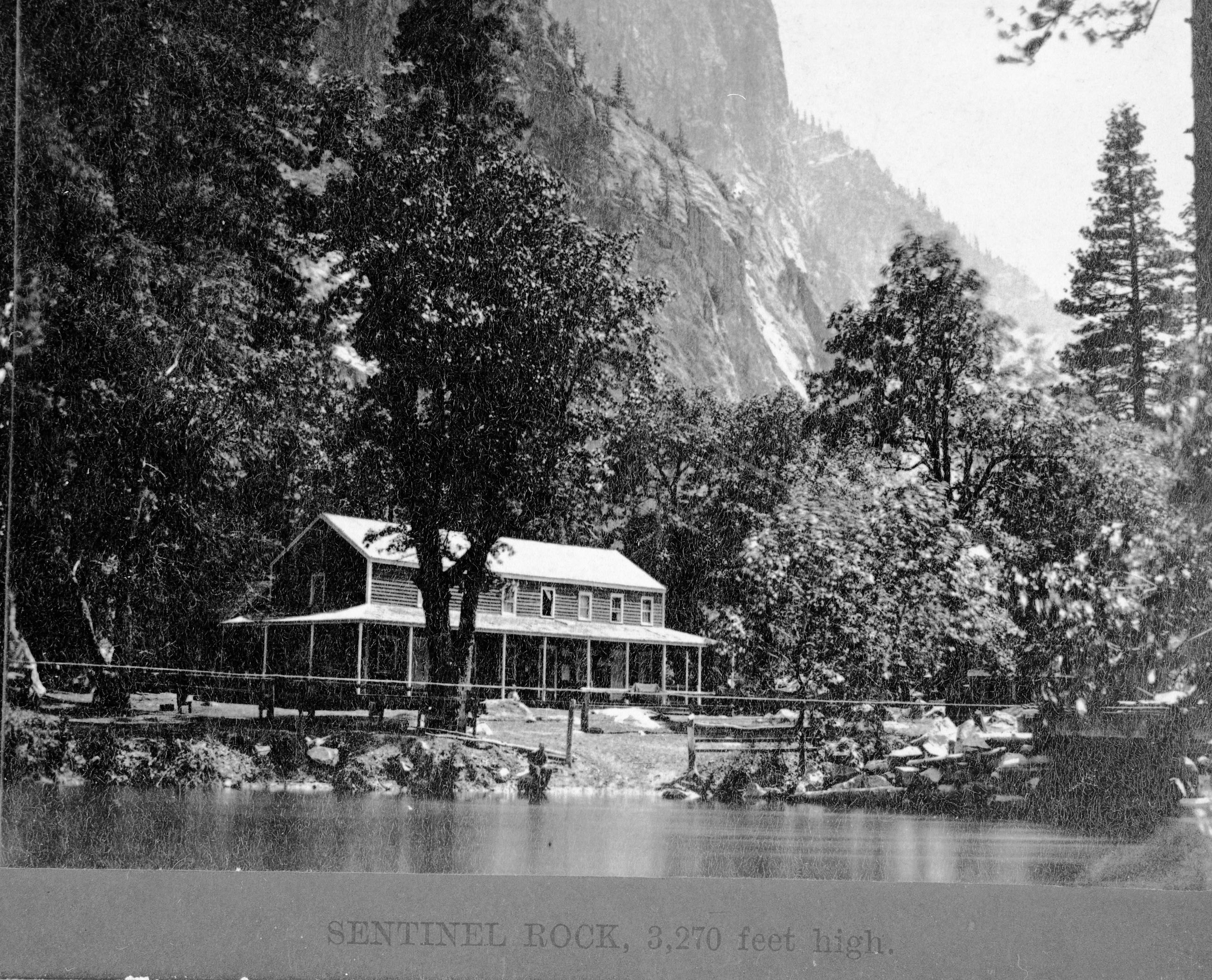 Detail of L. Smaus stereo (RL-16,546). Caption: "SENTINEL ROCK, 3,270 feet high". Hutchings' Hotel. copied July 1985