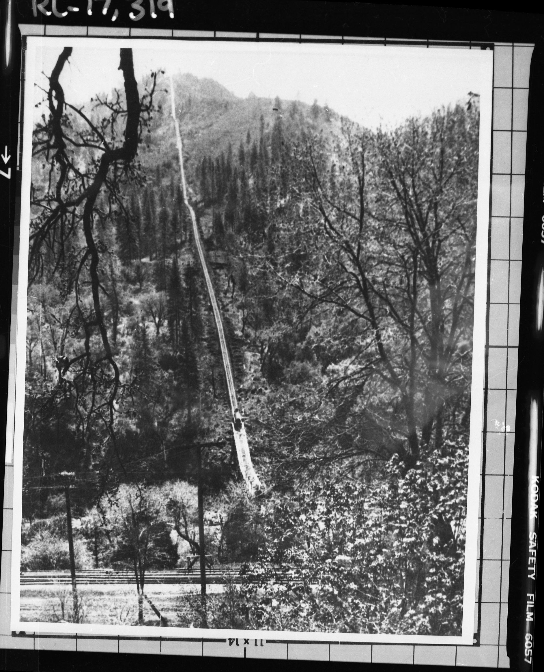 Copy Neg: J. Ernest, 1983. First incline across from El Portal shortly after completion. Operations began on August 2, 1912 after more than a year of construction. (Printed in Hank Johnston's Short Line to Paradise). Original print in the over-sized photo drawer in RL.