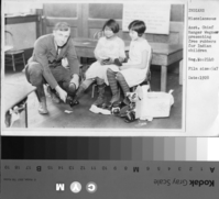 Asst. Chief Ranger Wegner presenting free rubbers for Native American children.