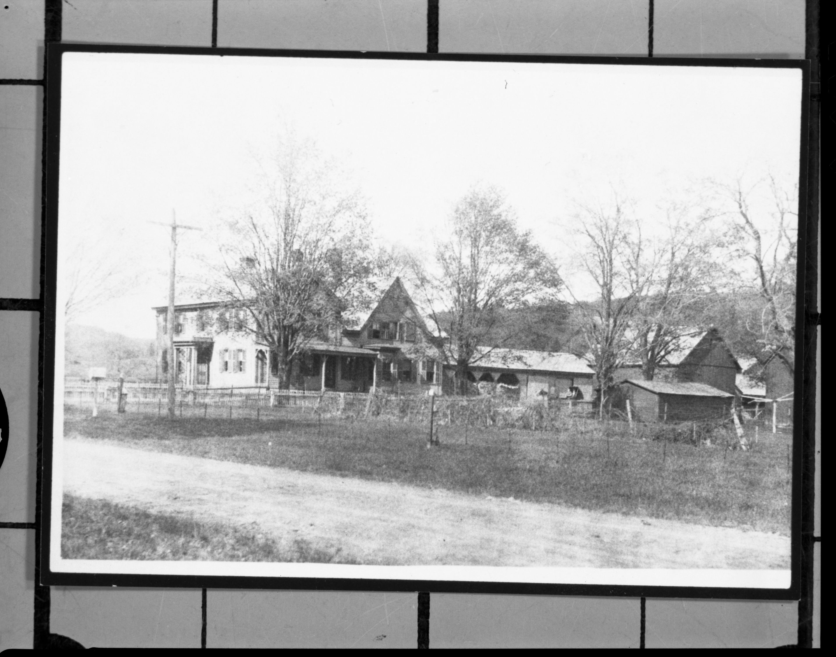 The Washburn home in Putney, Vermont. A 500 acre farm, whose chief crop was tobacco. Henry, Edward, John & Julius were raised on this farm. Julius remained there to raise tobacco, maple syrup and children (7) by 3 wives. He lived here all his life but died at the Wawona Hotel in 1907. Hugh Goodell (PHotogr:) was Julius' son-in-law. (Hugh is dead, but son is still alive). Copied courtesy of the Shirley Sargent Collection.