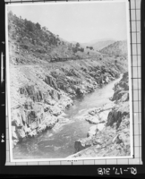 Copy Neg: J. Ernest, 1983. No. 21 pulling 3 car passenger train through Box Canyon in June, 1907. (Printed in Hank Johnston's Short Line to Paradise). Original print in the over-sized photo drawer in RL.