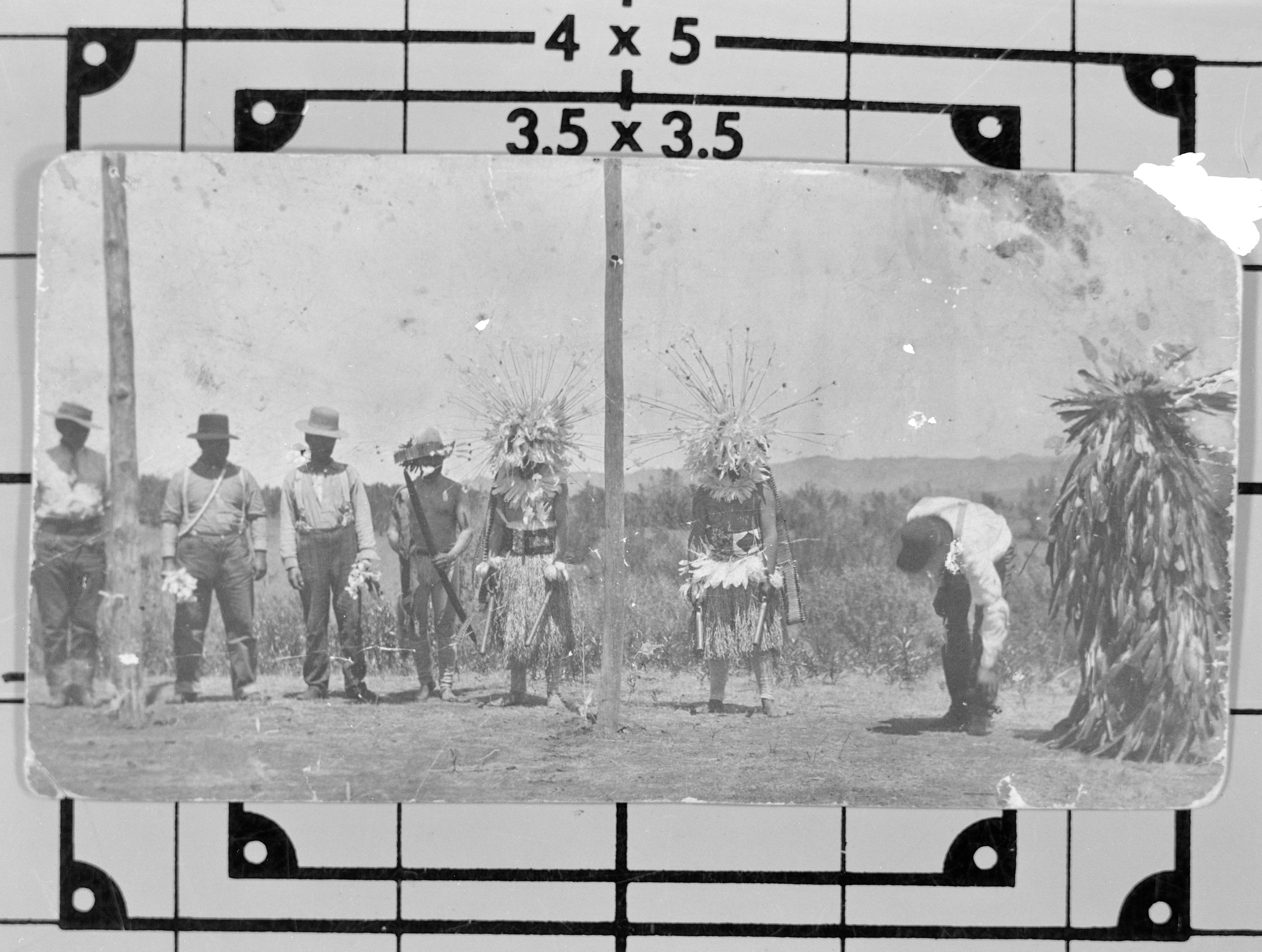 Hesi Ceremony at Stony Ford - Northeastern Pomo/Patwin Village. L to R: Jim Jeffers, George Bill, Jesse Berryessa, Santiago McDaniels, Louis James, _________, Woody Thatcher, Shoefly. Courtesy of the Craig Bates Collection.