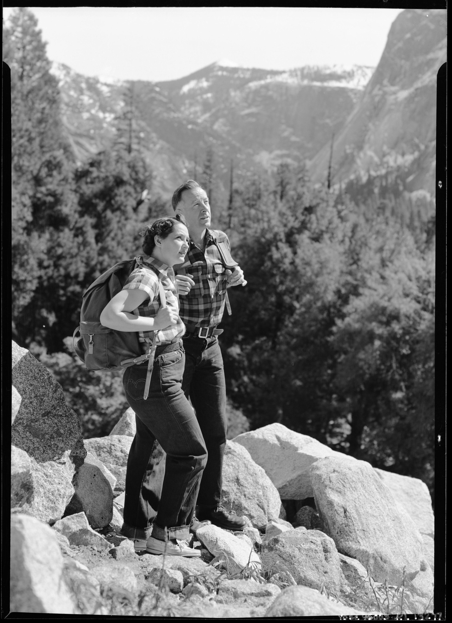 Ranger and Mrs. Sam Clark posed as hikers for a Museum exhibit.