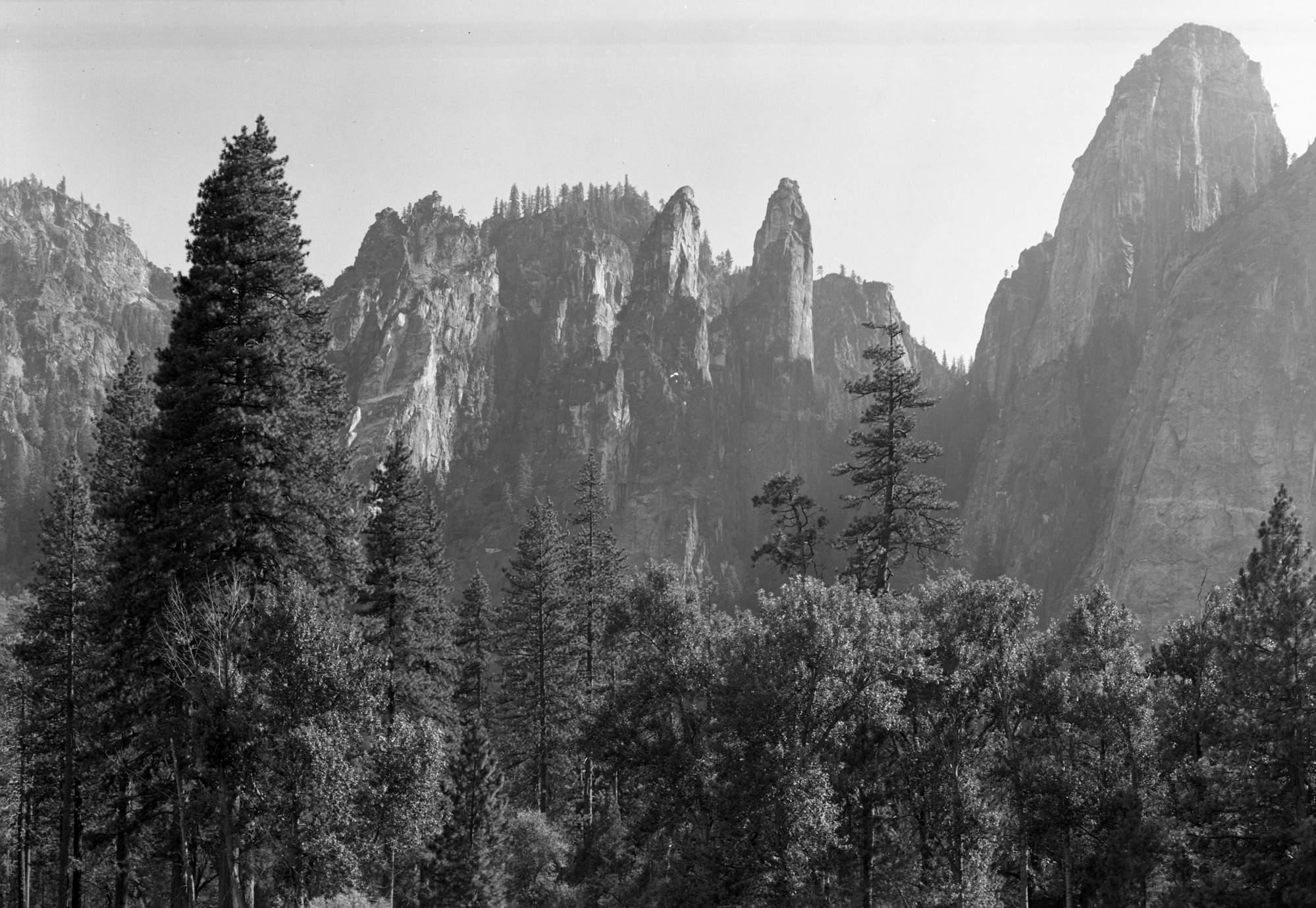 Aerial photograph of Half Dome from flight over park.