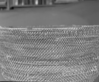 Private Collection. Object: Miwok basket. Dimensions: 18 x 10". Materials: Redbud and split willow shoots in original basket. Repairs in split maple shoots. Technology: Original basket is single rod, interlocking stitch, leftward coil direction. Repair begun on base of old basket and worked toward center until center 3 1/4", when clockspring start was stitched in to fill remainder two rows of coiling with two sewing strands at the same time, one redbud & one willow, near upper edge of original basket. Collection History: Collected by owner's mother. Murphys 1915. Photographed by Michael Dixon. Catalogued by Craig Bates and Barbara Beroza. Yosemite Collections, National Park Service.
