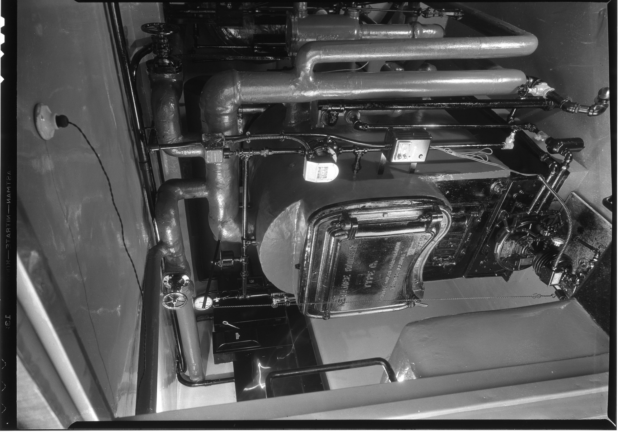 Furnace at the Rangers Club. REMARKS: Wide angle lens, using photoglood lights. Best shot use one light sprayed over furnace during e min. exposure at f. 22.