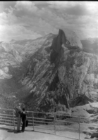 Tourists looking off Glacier Pt.