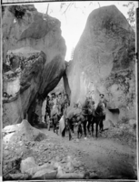 Copy Neg: May 1995 Leroy Radanovich. Wagon driving through Arch Rock. Donated to the Yosemite Museum by Aaron York.