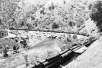 Copied by Jim Law, 1961. Eng: Stipp; Brakeman: Bullis & Loggins; Conductor: Jim Law. First log train after 1938 Reconstruction