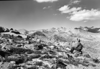 Post Peak Pass (Mt. Florence, Maclure, and Lyell in background). Mary During as weary hiker in foreground.