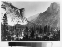 Copy Neg: MD 1986; Figure 11A from A Preliminary Survey of the Influence of White Man On The Vegetation of the Yosemite Valley by Gibbens. The eastern end of Yosemite Valley as it appeared when the Stoneman House, visible on the right, existed between 1887-1896. Young conifers are visible among the black oaks which predominated. Print from NPS copy neg. made by Ralph H. Anderson.