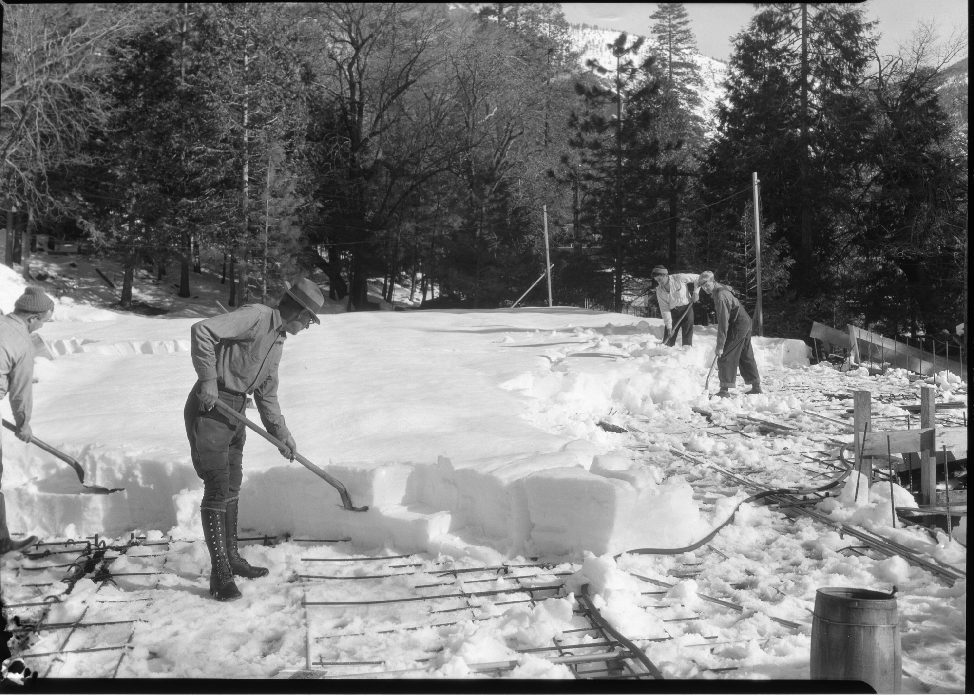 Shovelling snow off Utility Building. RHA (PWA).