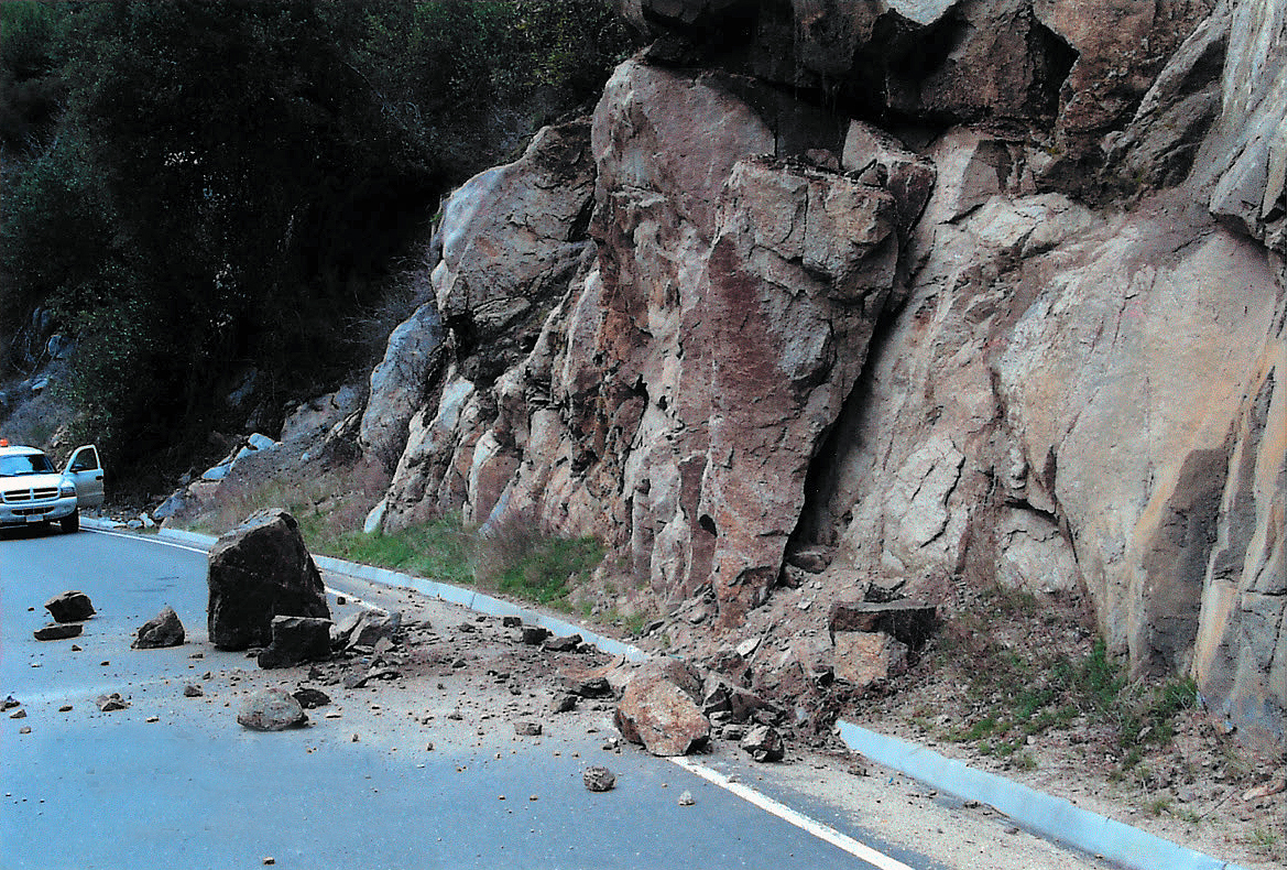 1999 Windy Point rock fall. A photograph taken by NPS Roads and Trails Branch Chief Jim Cyr shows 3 cubic meters of rock, in the form of one large boulder and several smaller ones, on the westbound lane of the El Portal Road near Windy Point.  