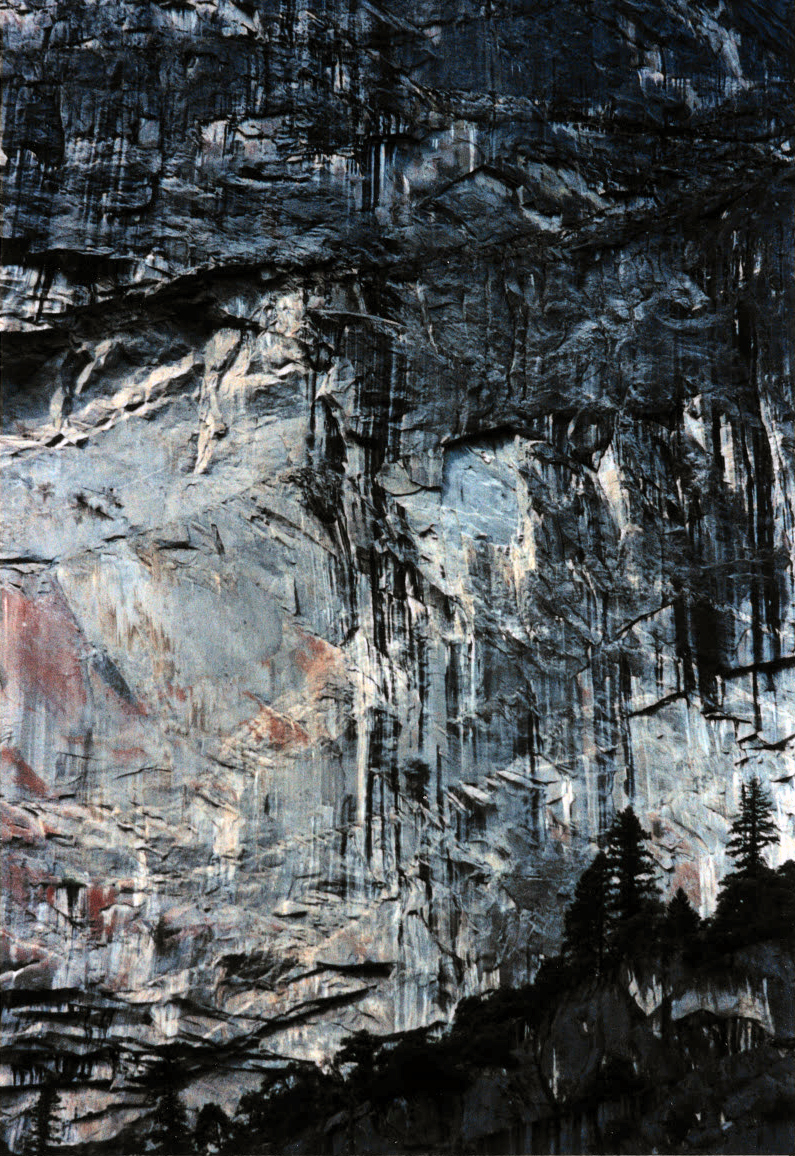 A rectangular-shaped light-colored scar on the cliff below Glacier Point and above the Ledge Trail.