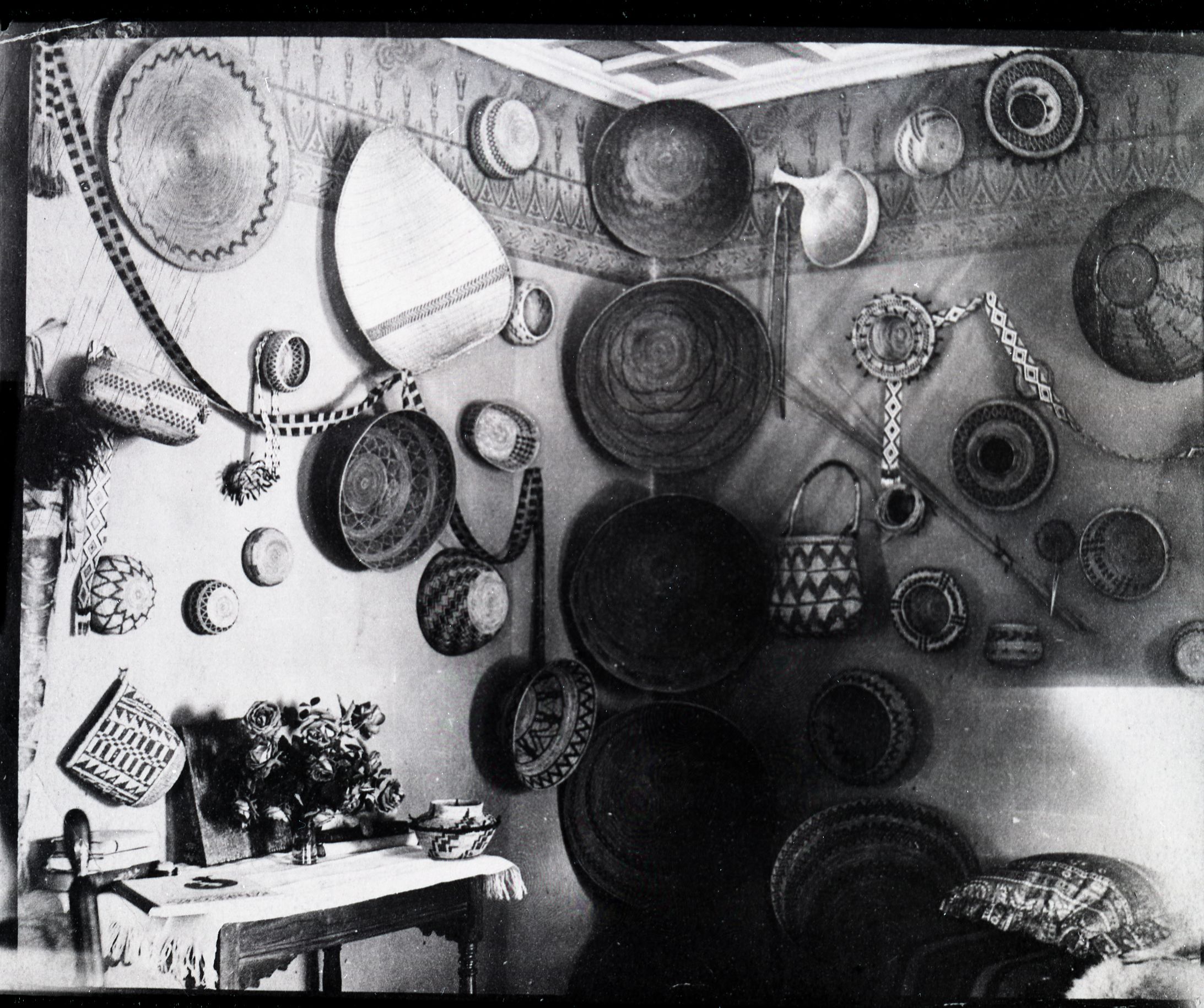Basket collection of Mrs. Etta Grace (Wm.) Sell, Sr. Made in the Yosemite-Ahwahnee region. Photo courtesy of her daughter, Mrs. Elenor Sell Crooks. This portion of the collection was destroyed by fire.