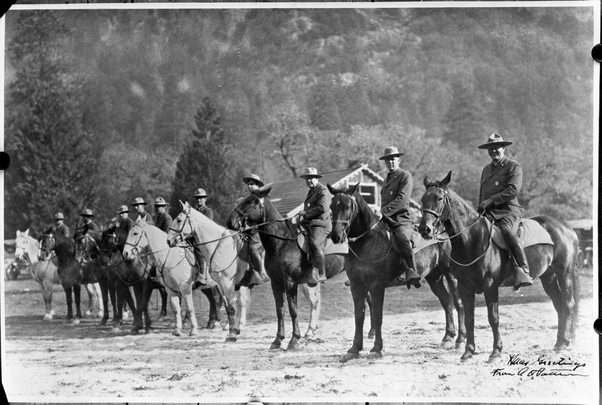 Dedication of New Village, Yosemite Ranger Force - 1924. L-R: Billy Nelson, Bert Sault, Dixon Freeland, John Bingaman, Charles Rich, Charles Adair, John Wegner, Henry Skelton, Clyde Boothe & Chief Forest Townsley. Photo used in John W. Bingaman's "Guardians of the Yosemite", p. 20 and in Shirley Sargent's "Yosemite & Its Innkeeps", p. 55. Original in YNP Collections #12,710
