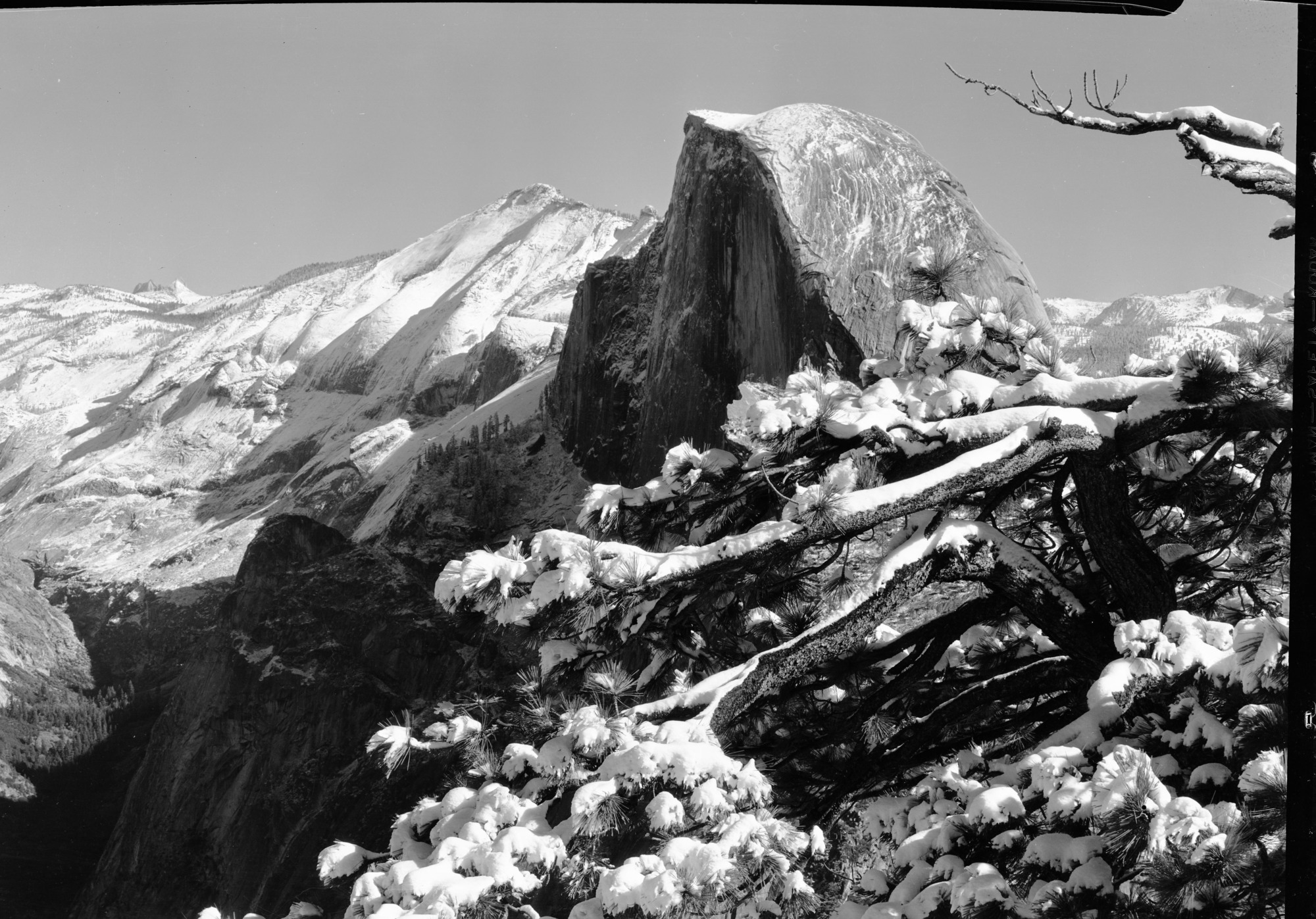Telephoto of Half Dome after first snowfall. From Glacier Point.
