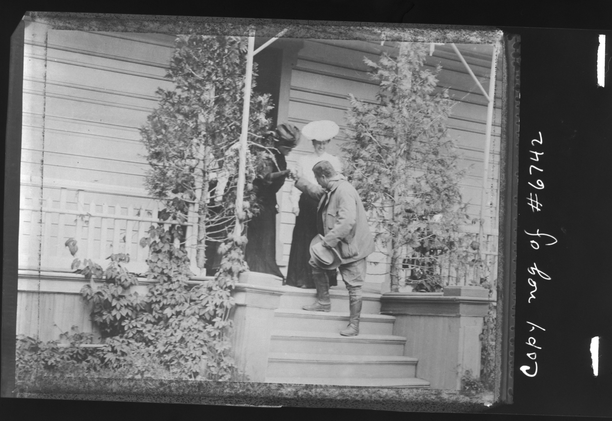 Willeta Hill & Estella Washburn bidding Pres. Theodore Roosevelt goodbye after he visited the Thomas Hill studio. Copy neg. of Yosemite Collections #6742. Also in Shirley Sargent's Wawona book, p. 57.