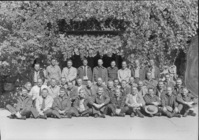 Building Fire School in front of Yosemite Museum. School term - October 18-27, 1948. LEFT TO RIGHT: BACK ROW: Bill Hackman, Mt. Rainier; Stanley McComan, Yosemite; Al Rose, Mt. Ranier, Chief Rang.; Homer Robinson, Yosemite, Asst. Chief; Elmer Fladmark, Glacier, Chief Rang.; Odin Johnson, Yosemite - Ranger; J. Leonard Volz, Mt. Ranier, Ranger; Floyd Dickinson, Olympic - Ranger. Paul Judge, Grand Teton, Chief Rang. MIDDLE ROW: W.R. Oakes, Olympic, Asst. Chief; Less Bodine, Lassen, Ranger; John L. Chambers, Wind Cave, Maint. Foreman; Maynard Barrows, Region 2, Forester; Lynn Coffin, Rocky Mtn. Dist. Ranger; Ted Ogsten, Death Valley, Chief Ranger; Clyde Gilbert, Crater Lake, Chief Ranger; Richard Nelson, Glacier Asst. Chief; Henry C. Schmidt,Sequoia, Dist. Ranger; L.M. Yansen, Ranier, Concessioner; John Jay, Yellowstone, Dist. Ranger; Lawrence Taylor, Yosemite, Concessioner; Floyd Towne, Ranier, Concessioner; Emil Ernst, Yosemite, Forester; Jack Dodd, Region 4 Forester; Lou Hallock, Yosemite Dist. Ranger; Henry R