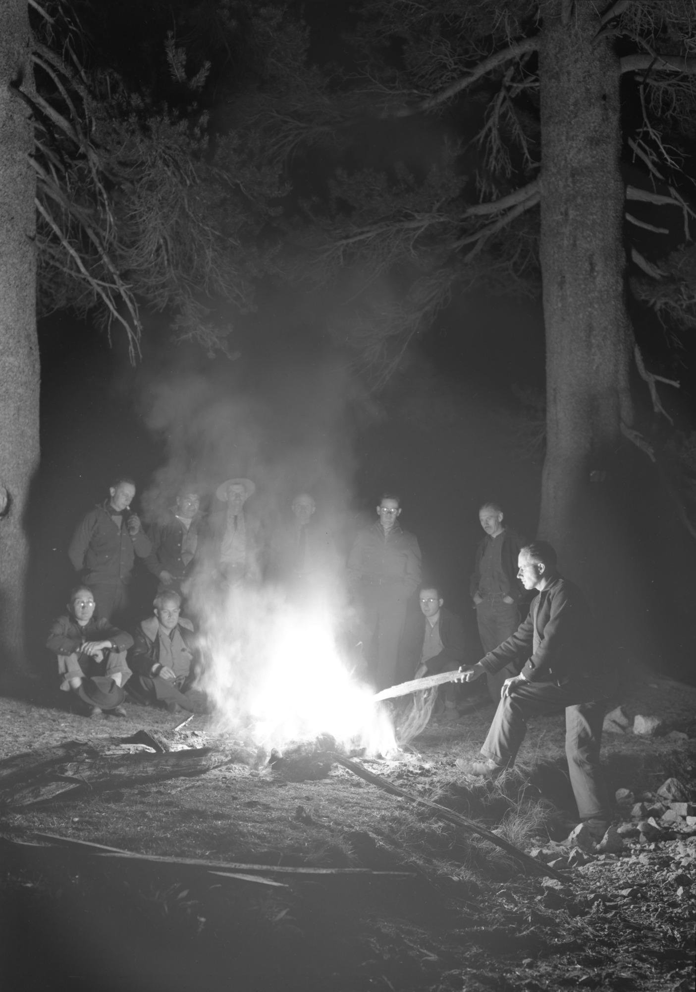 Group around campfire at Wilmer Lake