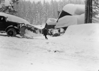 Heavy snow at Badger Pass and snowplows.