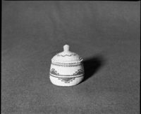 Marie Rozier Collection, Catalog No. 121. Object: Yurok/Karok/Hupa basket. Dimensions: 4 1/2 x 3 1/2". Materials: Conifer root, maidenhair fern stem, beargrass. Collection History: Mrs. S. M. Long Collection, collected 1890 to 1910. Photographed by Michael Dixon in December 1982. Catalogued by Craig Bates and Barbara Beroza. Yosemite Collections, National Park Service.