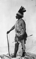 Indian dance leader in his war dance costume. Copied by Ralph H. Anderson by 1941.
