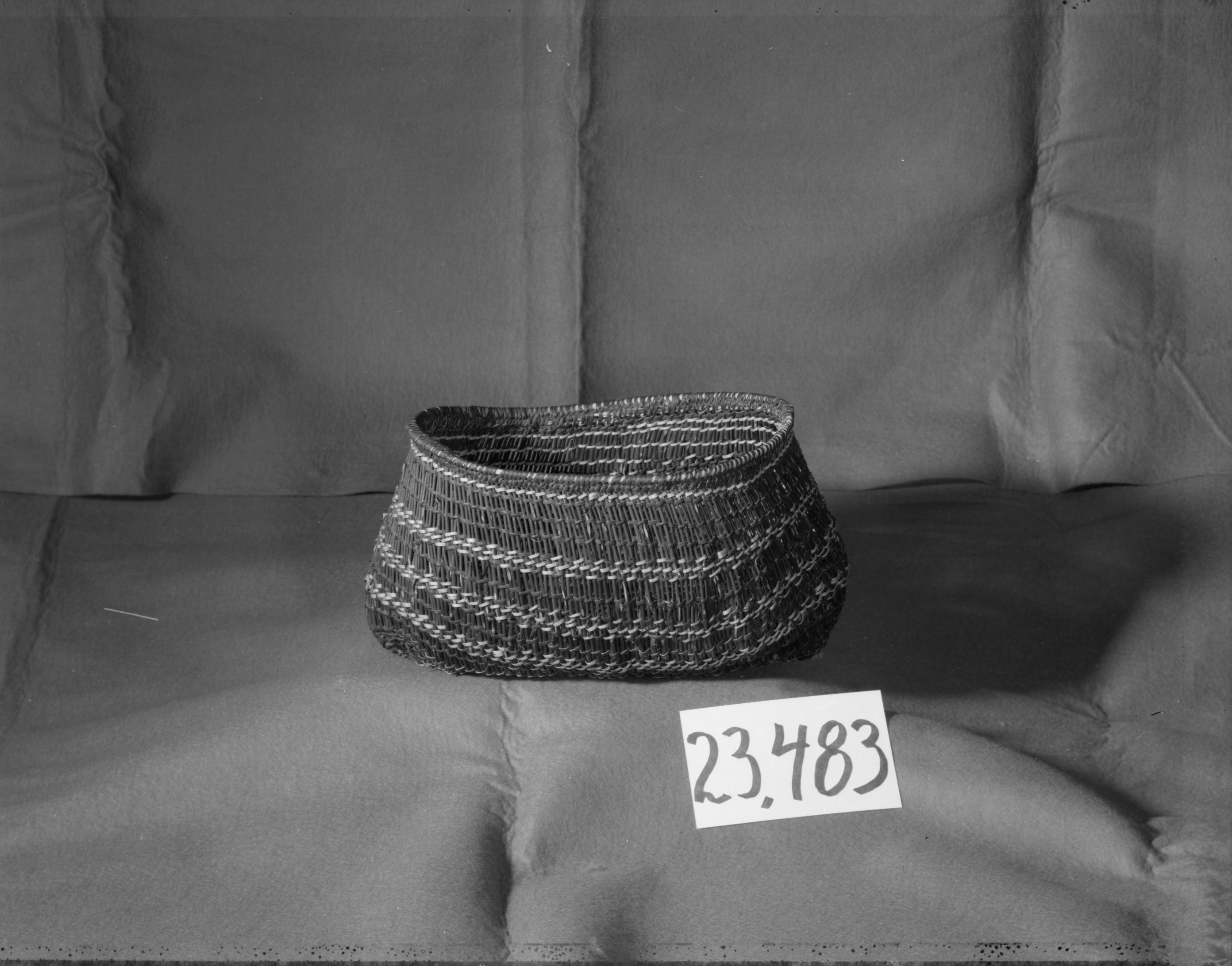 Twine storage basket, Western Mono. Entirely redbud, diagonally twined. Rimstick - Ceanothus sp. In the YNP Collections (cat. no. 23,483). Used in the Indian Cultural Program.