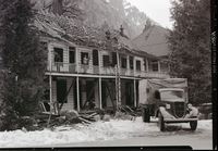 Tearing down old Cedar Cottage.