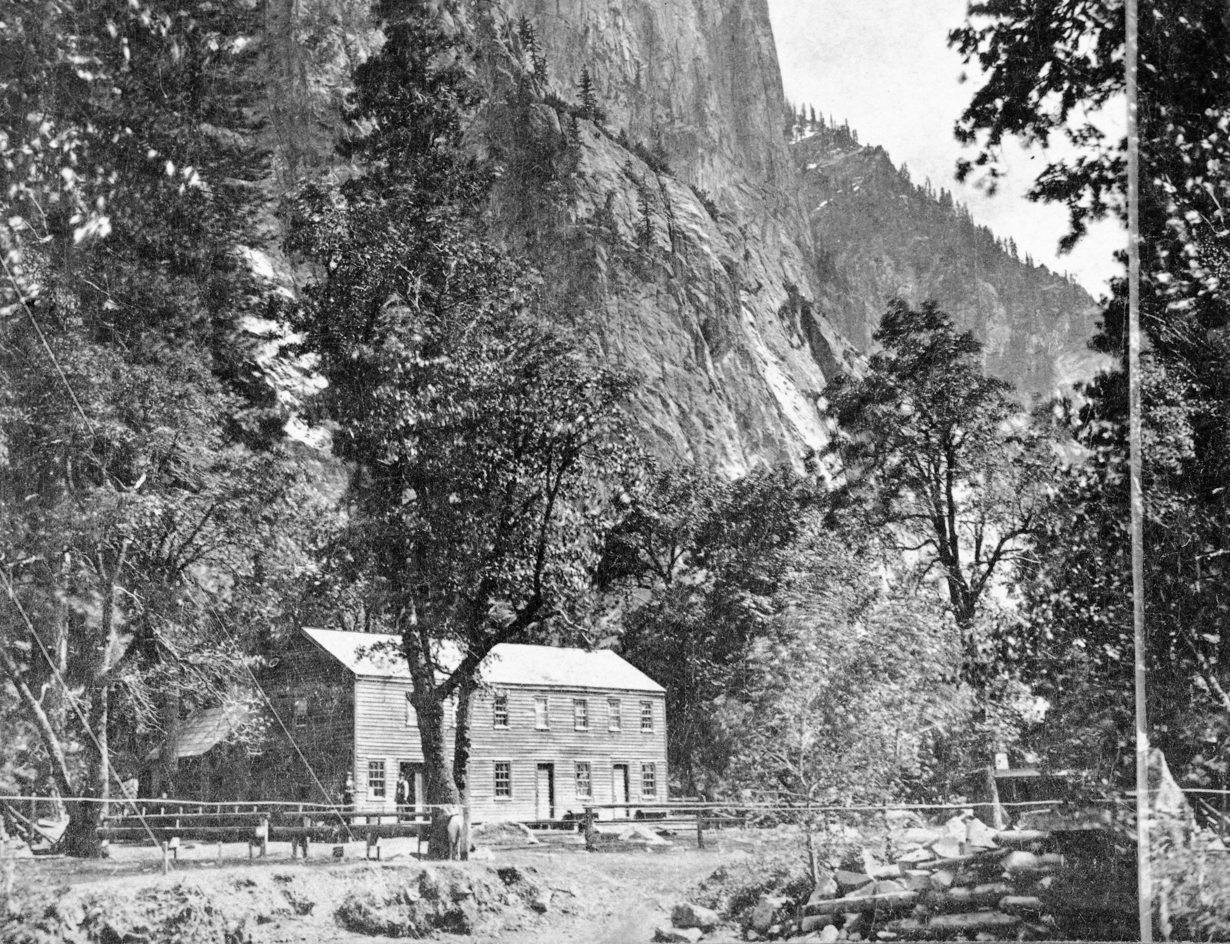 Detail of L. Smaus stereo (RL-16,524). Caption: "Sentinel Rock, 3,276 feet high, Yosemite Valley, Cal." Hutching's Hotel. copied by Michael Dixon, copied July 1985