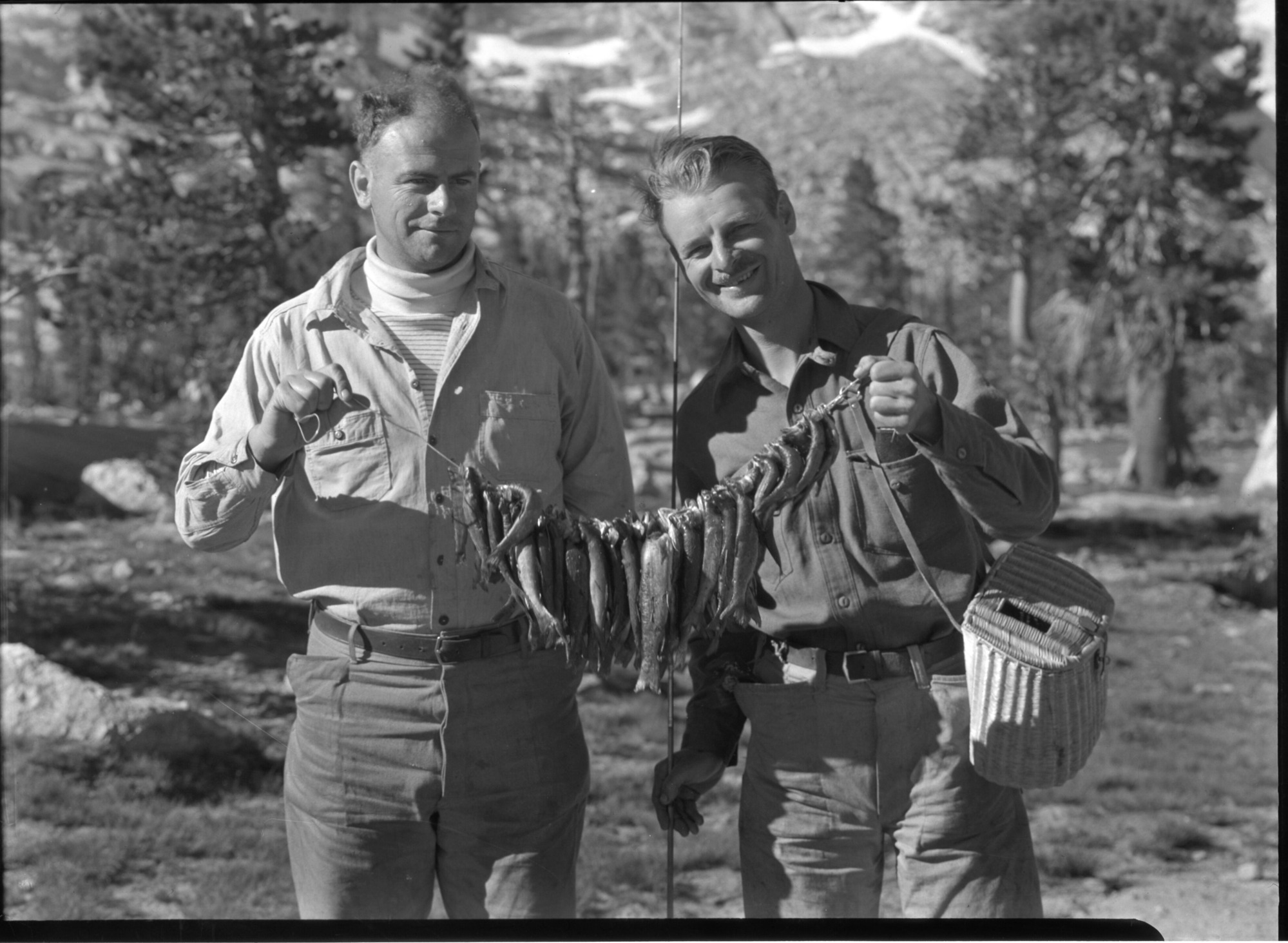 Mr. H.V. Harris of 4305 Santa Fe Ave, Vernon, CA; showing catch of fish near Vogelsang.