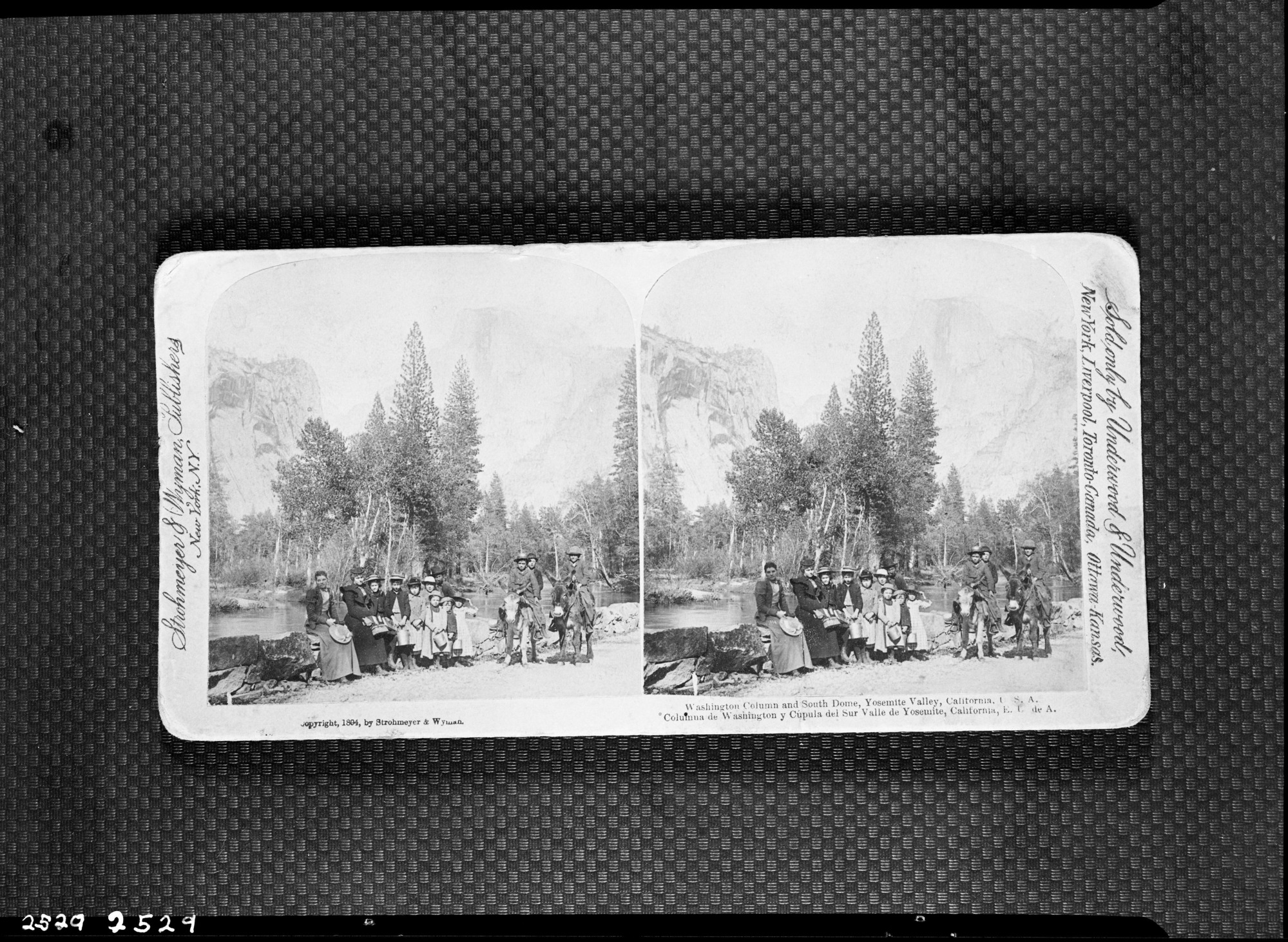 Stereo showing early day school group loaned by by Mrs. Gallison, teacher (2nd from left). copied by Ralph H. Anderson.  copied July 30, 1952.