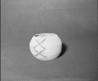 Mrs. Donald Segerstrom Collection. Object: Paiute basket. Dimensions: 8 x 6". Materials: willow and commercially-dyed willow. Technology: single rod foundation, leftward coil direction, non-interlocking stitch. Collection History: ---. Photographed by Michael Dixon, 1/83. Catalogued by Craig Bates and Barbara Beroza. Yosemite Collections, National Park Service.