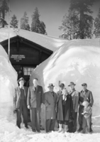 After record snowfall. In pictures are Mr. and Mrs. Arthur Demaray, recently retired Director of NPS; Mr. and Mrs. Wesley, landscape engineer of Region Four; Supt. Carl P. Russell; Ranger John Mahoney; E. C. Smith, park engineer; District Ranger buck Evans and his daughter Jeanie.