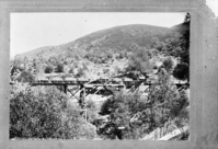 William Stevenson original. Coulterville locomotive pulling ore from the Mar Harrison to the mill about 3 miles down the railroad. copied by Ralph H. Anderson