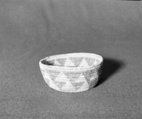 Marie Rozier Collection, Catalog No. 169. Object: Unknown origin. Dimensions: 7 x 3". Materials: Split willow shoots, split devil's cloth. Technology: Tree rod willow, interlocking stitch, fag ends concealed in foundation, moving ends trimmed on back face, leftward coil direction. Collection History: Acquired from Ora Doyle. Photographed by Michael Dixon in December 1982. Catalogued by Craig Bates and Barbara Beroza. Yosemite Collections, National Park Service.
