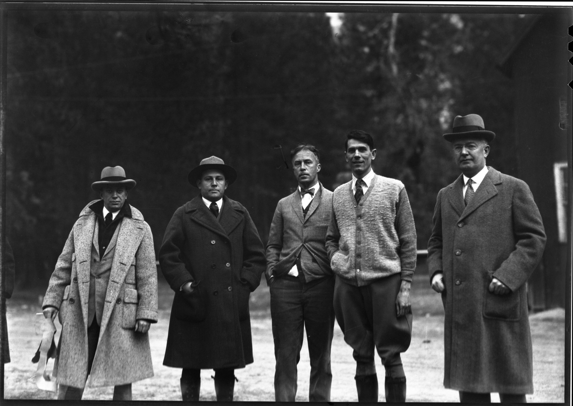 Looking over grounds for Ahwahnee Hotel. L-R: G.S. Underwood (Architect), Dan Hull (NPS Landscape Engineer), Mr. Lansdale (YP&CC Director), Dr. Tresidder (Pres. YP&CC) and Mr. John Drum (Director)