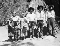 Left to right back: Sally Lundy (Mrs. Sim Lundy); Maggie "Tabuce" Howard, Sim Lundy (Maggie's son); Johnny Lundy (Maggie's grandson); Christy Lundy (Maggie's grandson); Children in front: Elaine and Andrew Lundy. Original in the YNP Collection.