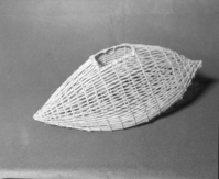 Mrs. Donald Segerstrom Collection. Object: Paiute fish trap. Dimensions: 20" length. Materials: Entirely willow. Technology: Twined with scraped whole willow shoots, down to right slant of turns, opening bound with split willow shoots. Photographed by Michael Dixon. Catalogued by Craig Bates and Barbara Beroza. Yosemite Collections, National Park Service. 1/83.