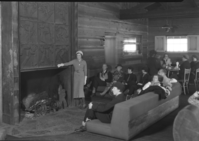 Interior of Badger Pass Ski House with Miss Australia. Miss Peggy Gamble of Melbourne, Australia. Chosen from 2,000 girls to represent her country at the Tournament of Roses."
