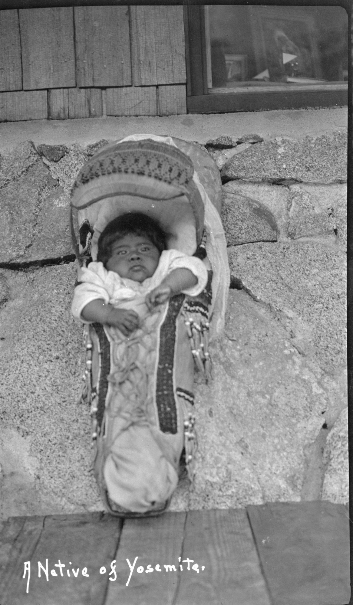 Copy of a postcard. Paiute style cradleboard.