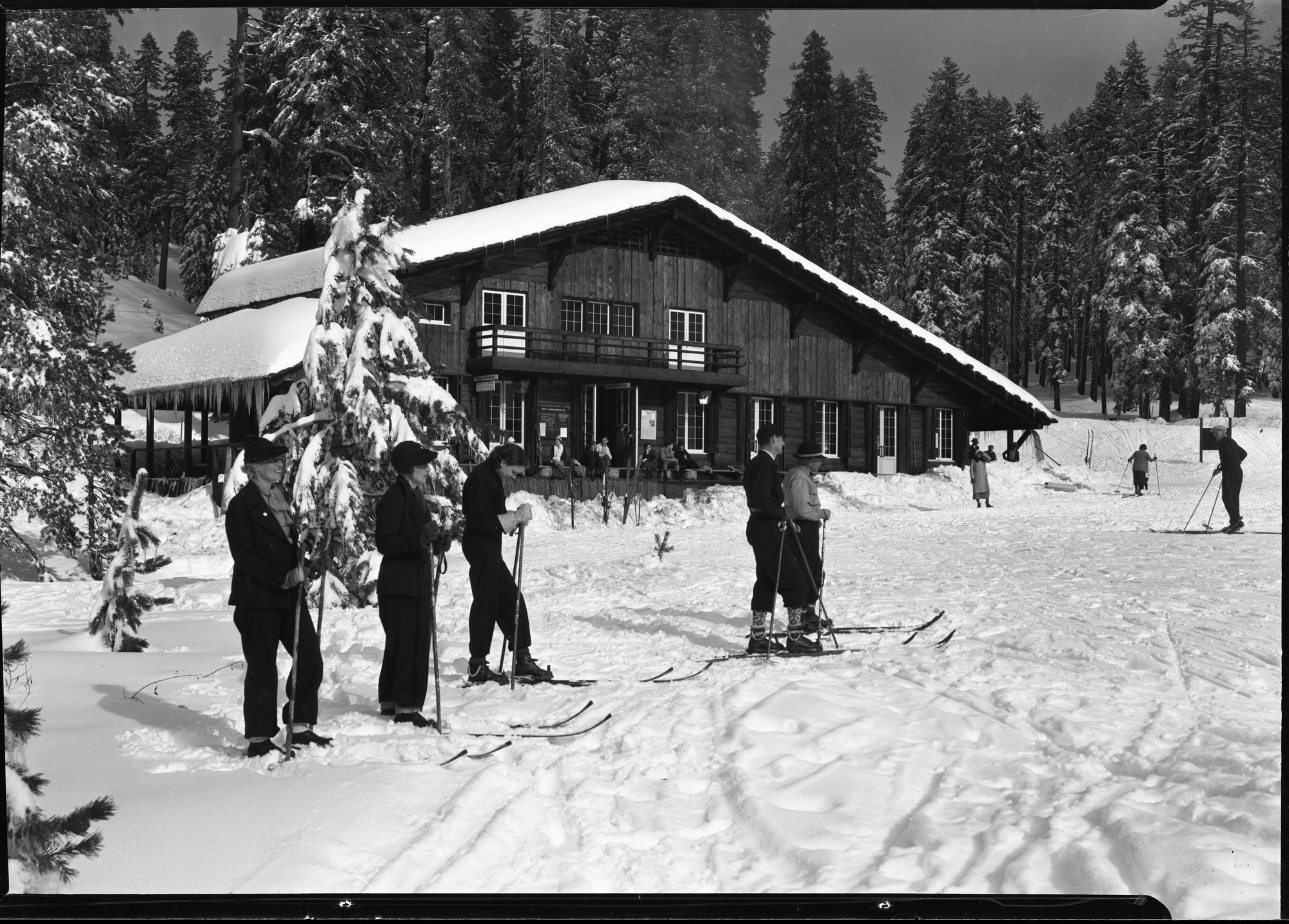 New Badger Pass Ski House with skiers.