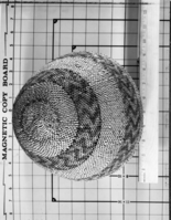 Paiute twined cop. Willow shoot warp, split weft. Design touched up with dye of ephedra sp. and yellow ochre. In Yosemite Collections #25,231.