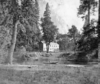 Detail of stereo from L. Smaus collection (RL-16,527). Captioned "62. View on the Merced, Hutchings' Hotel and Bridge. Sentinel Rock in distance." copied by Michael Dixon, copied July 1985