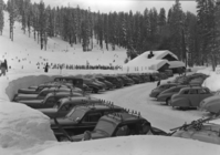 Crowded parking area at Badger Pass.